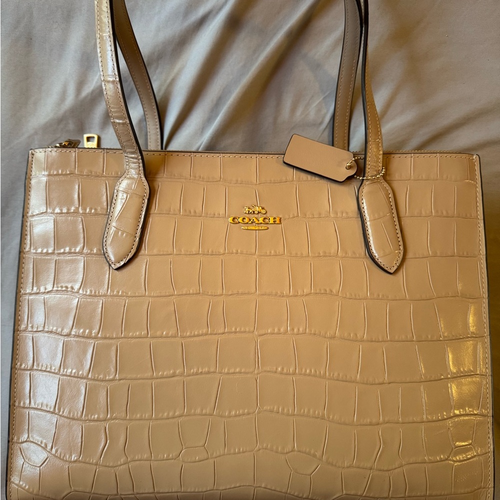 Brand new w/tags Coach purse. Retails for $578. Asking $350